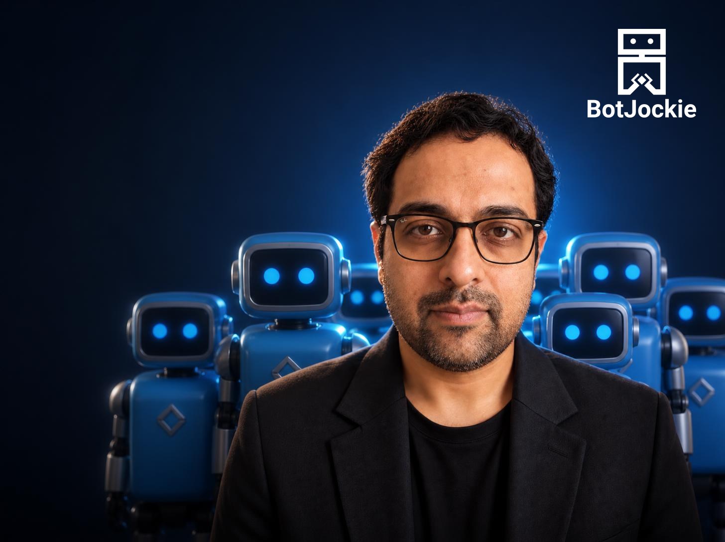 Bhavin Javia, BotJockie founder, with a team of BotJockie robots behind him